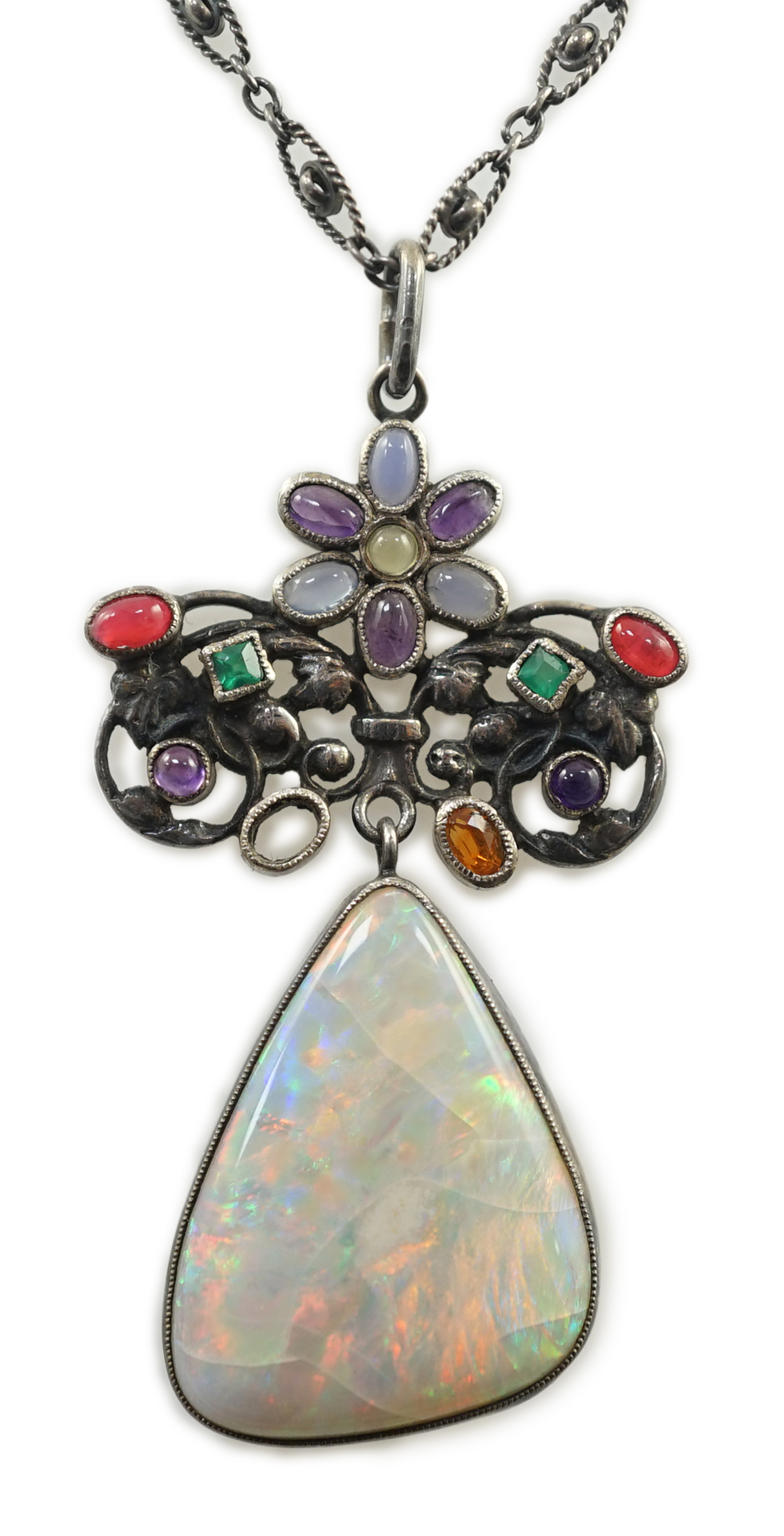 An early 20th century silver, white opal and cabochon gem cluster set drop pendant necklace, in the manner of Sibyl Dunlop